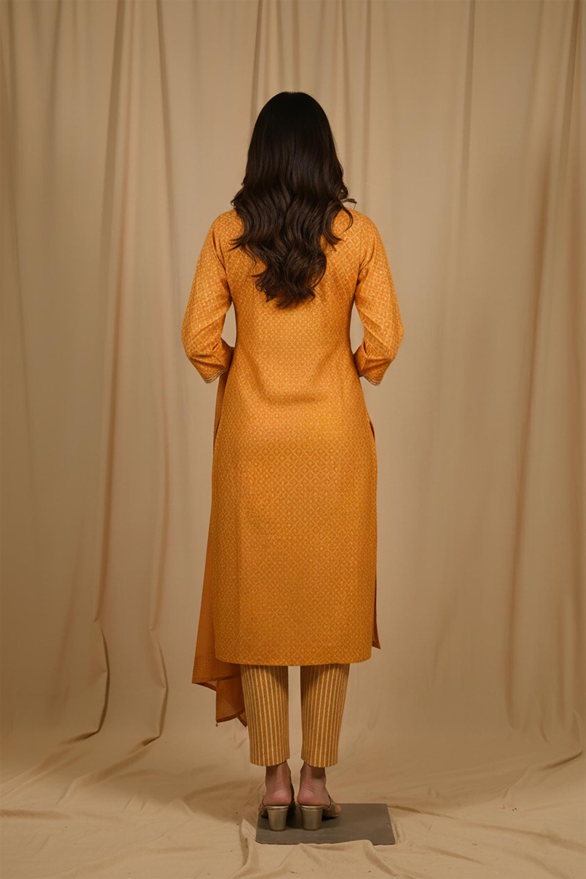 SN112 marigold kurta set back view with geometric print, straight fit and clean silhouette