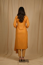 SN112 marigold kurta set back view with geometric print, straight fit and clean silhouette
