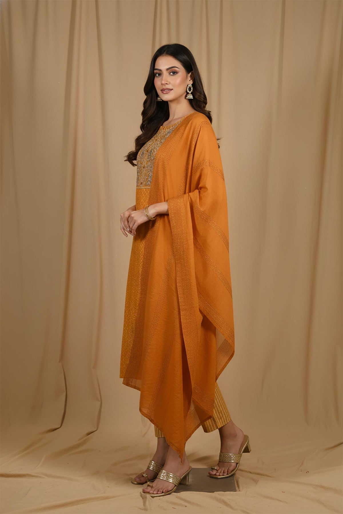 SN112 marigold kurta set side view with straight silhouette, dupatta drape and striped pants