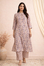 SN117 women’s dusty blush floral cotton kurta pant set with straight pants styled in walking pose