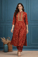 SN122 women’s red printed cotton kurta pant set walking pose with mid-calf length and easy movement
