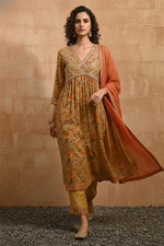 SN123 women’s mustard floral Anarkali kurta set with flowing dupatta, walking pose