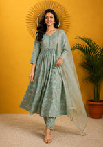 SN127 women’s sage green Anarkali set walking pose with dupatta movement V-neck long sleeve