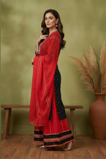 SN129 women’s midnight teal kurta sharara set with three-quarter sleeves and red dupatta, side pose.
