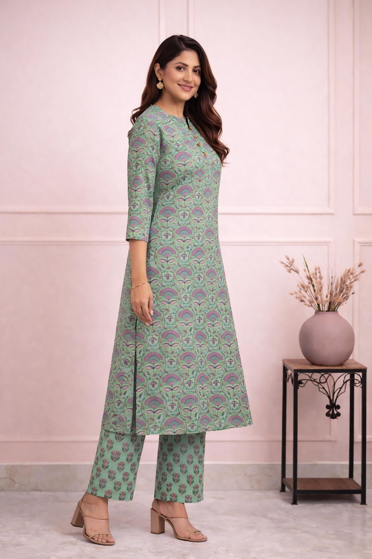 SN138 Aarini leaf green floral cotton kurta pant set for women side pose with straight fit silhouette