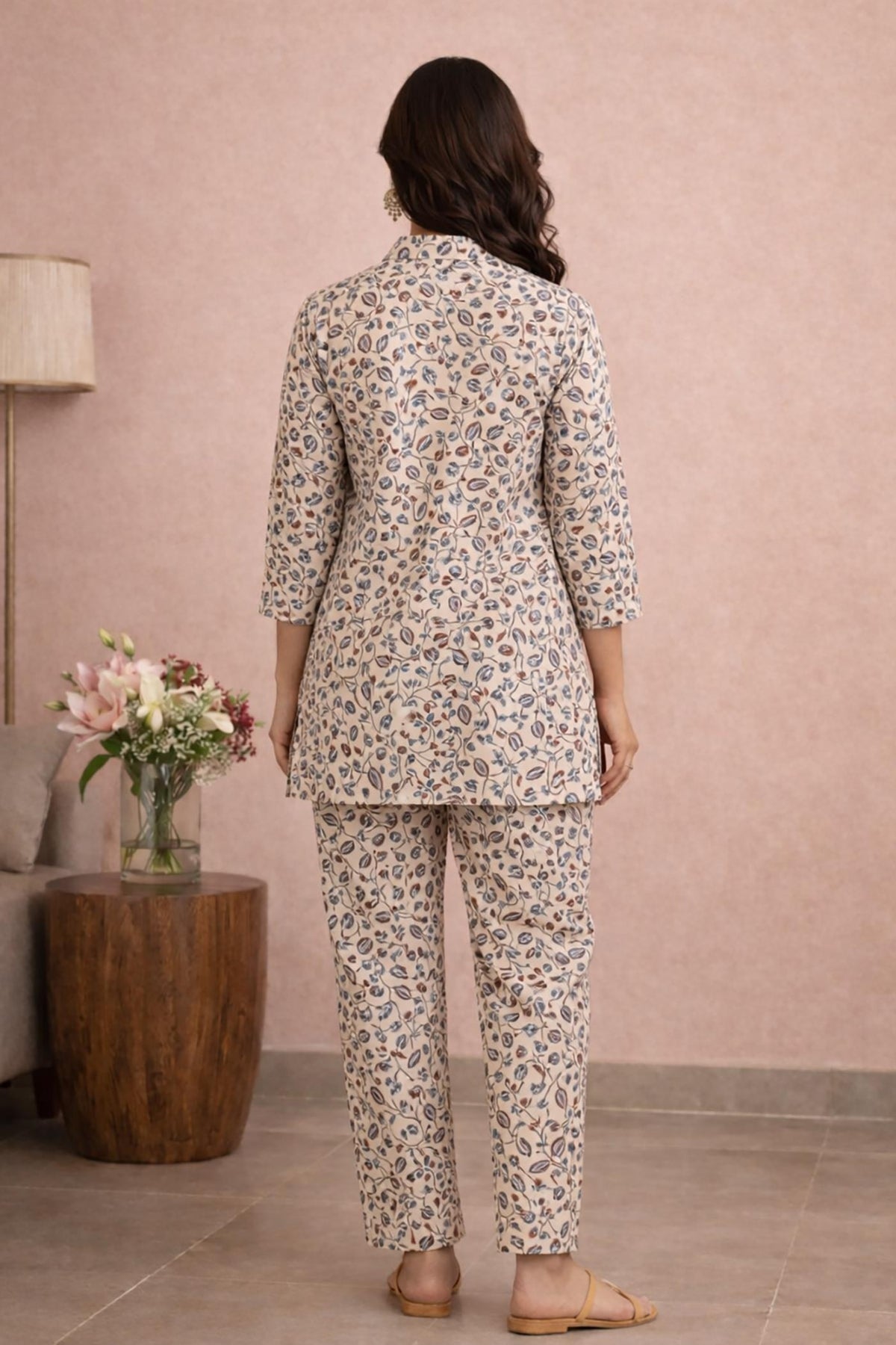 SN160 women’s ivory botanical print cotton kurta pant set back pose with straight silhouette