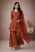 SN162 women’s red cotton silk kurta sharara set with V-neck and flowing dupatta walking pose.
