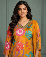SN168 women’s mustard abstract print V-neck kurta set closeup showing neckline embroidery detail