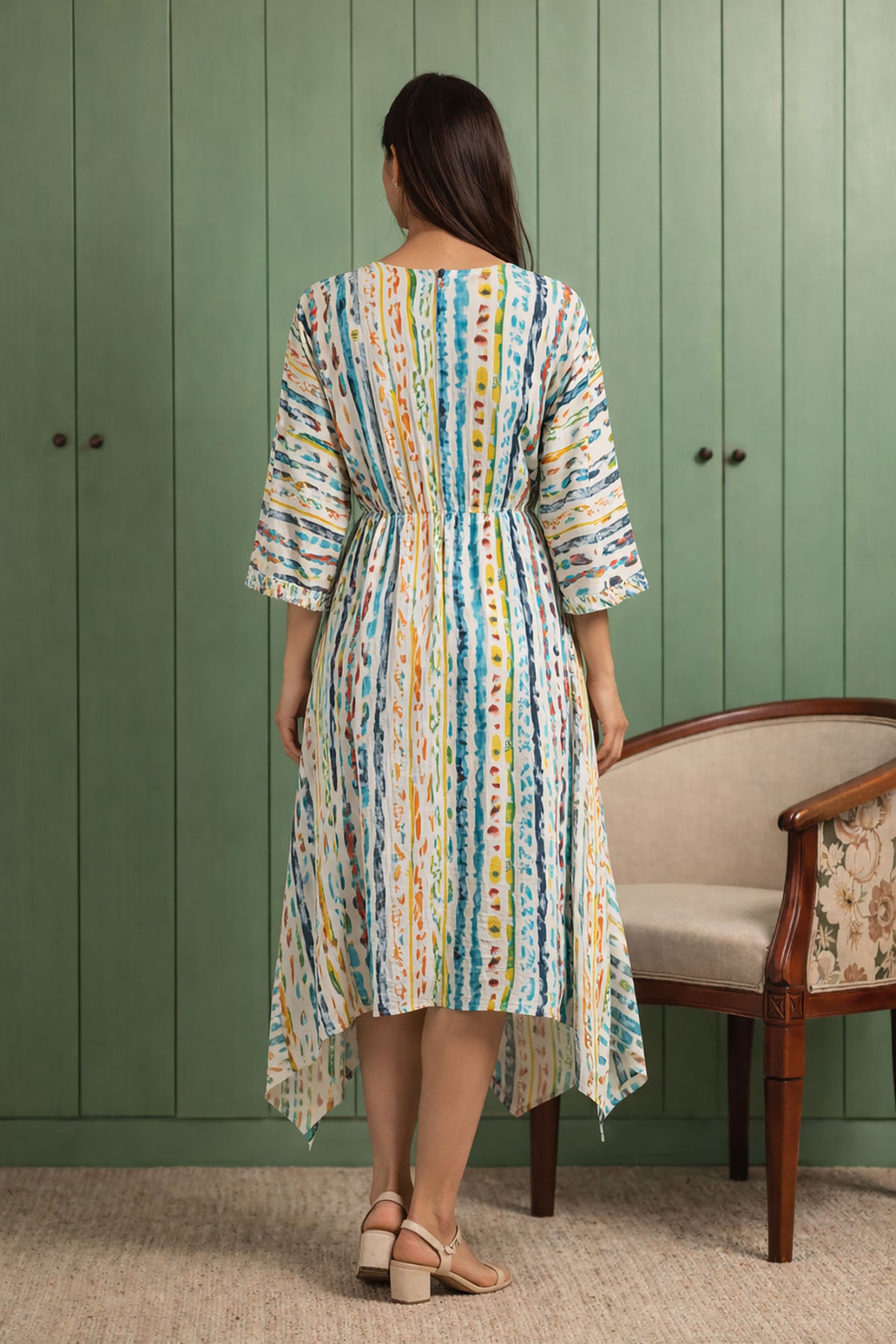 Back view of women’s multicolor cotton midi dress with relaxed fit and flow