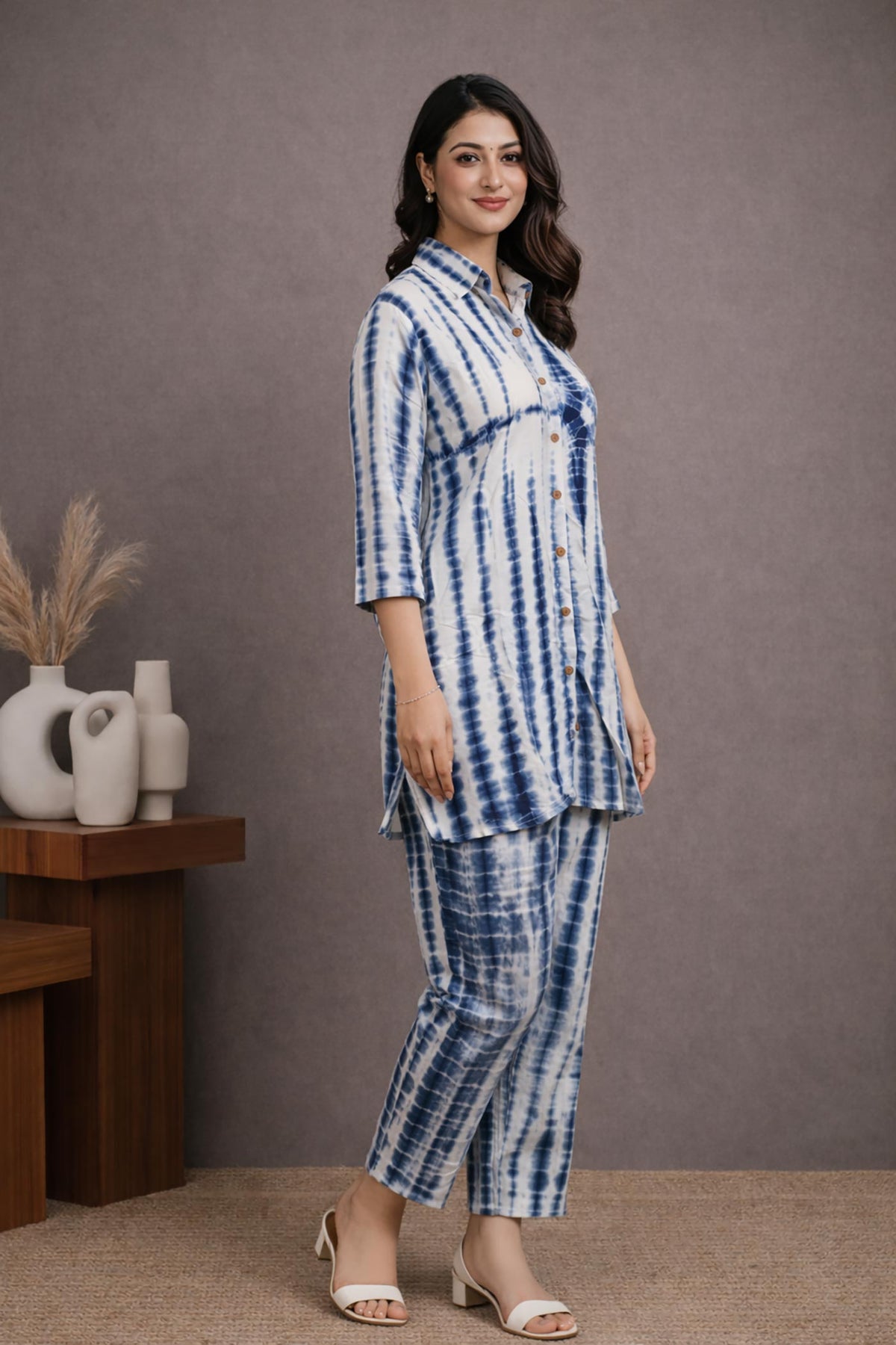 SN173 women’s indigo tie-dye cotton cord set with curved hem tunic and straight pants, side pose.