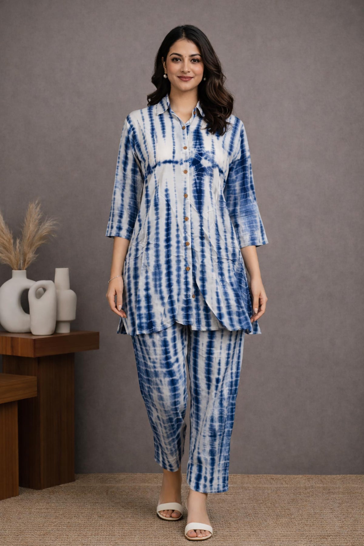SN173 women’s indigo tie-dye cotton cord set in walking pose with relaxed fit and ankle-length pants.
