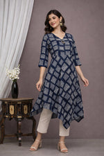SN176 women’s navy blue geometric cotton asymmetric dress side pose highlighting flared hem and V-neck design.