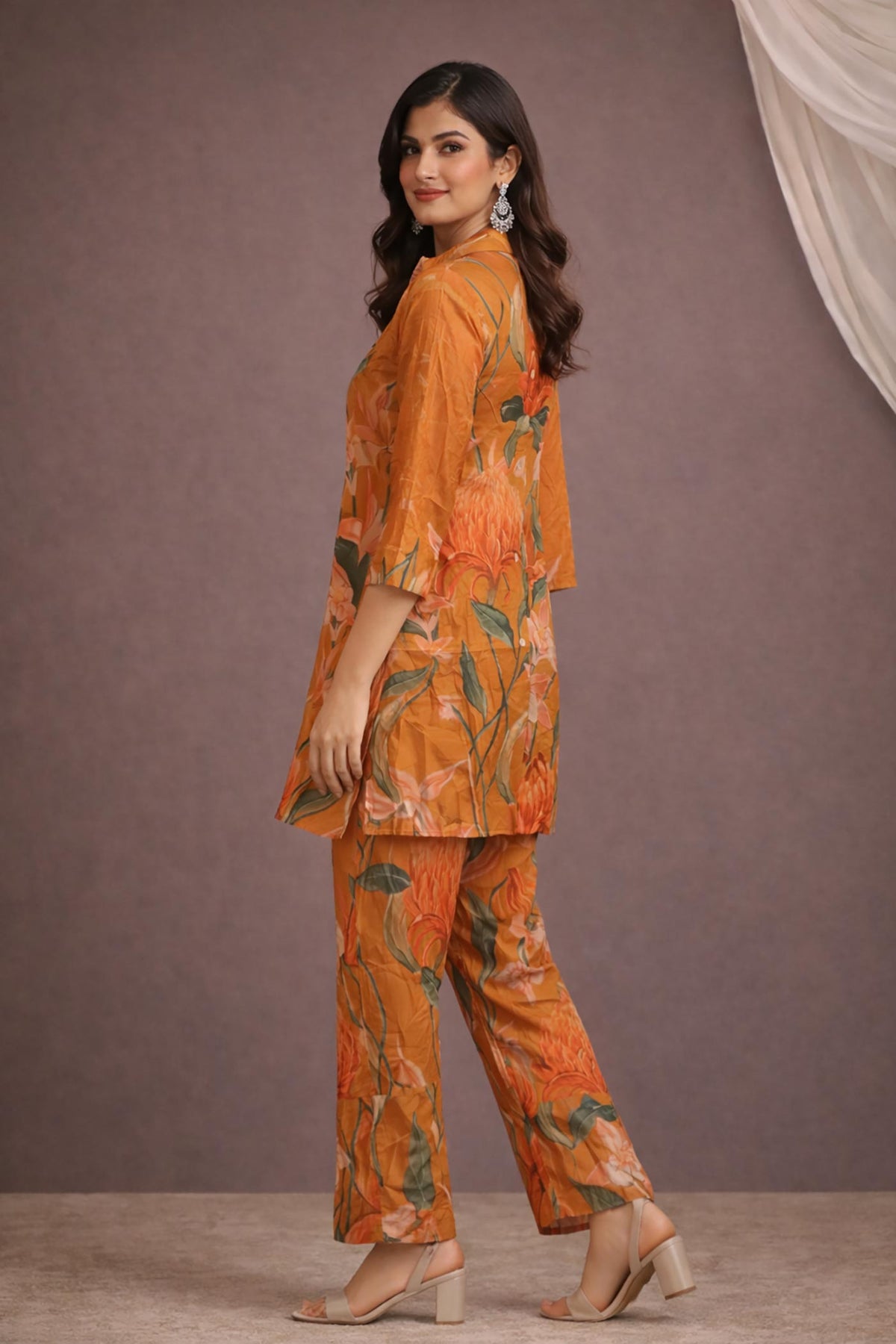 SN182 women’s burnt saffron floral silk blend co-ord set side view with long sleeves and straight pants