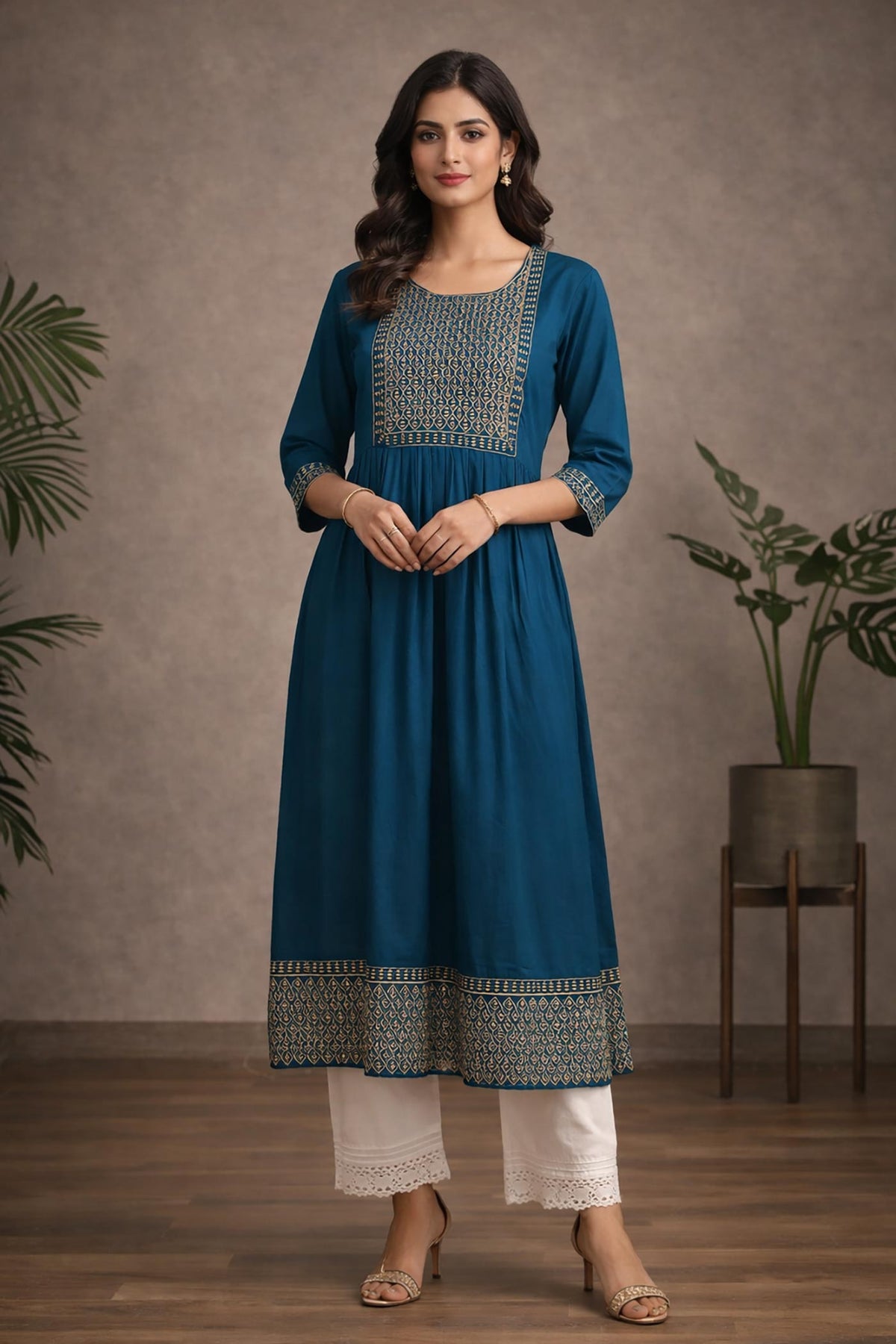 SN183 women’s teal blue embroidered cotton kurti, round neck, three-quarter sleeves, front pose with flared silhouette