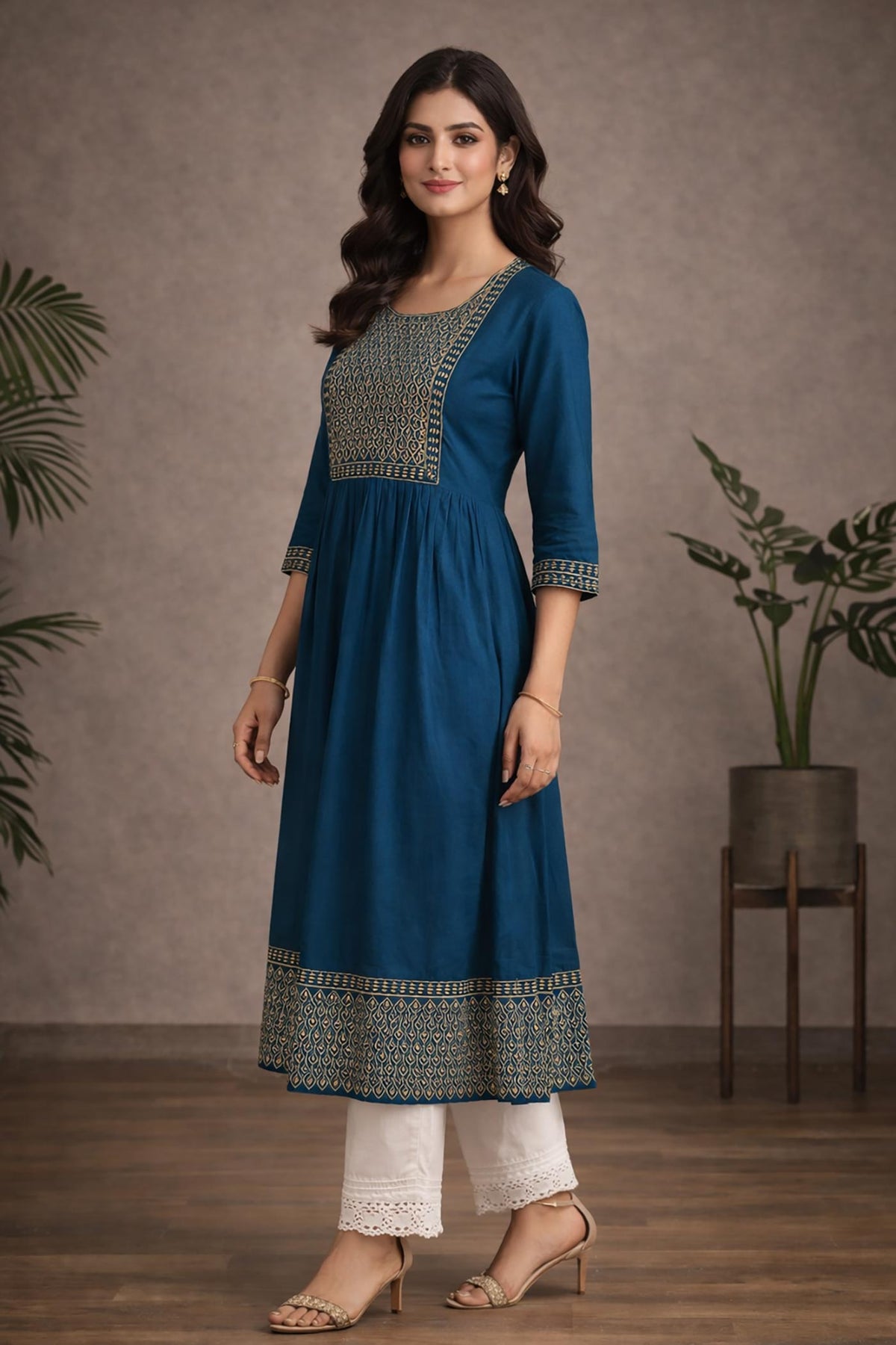 SN183 women’s teal blue embroidered cotton kurti, side pose showing flared fit and three-quarter sleeves