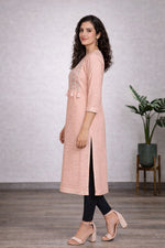 SN196 women’s blush pink chikankari cotton kurti side pose with straight fit silhouette