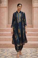 SN211 women’s indigo viscose kurta pant set walking pose with three-quarter sleeves and gold placket detail