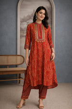 SN214 women’s vermilion red cotton kurta pant set with embellished yoke and three-quarter sleeves front pose