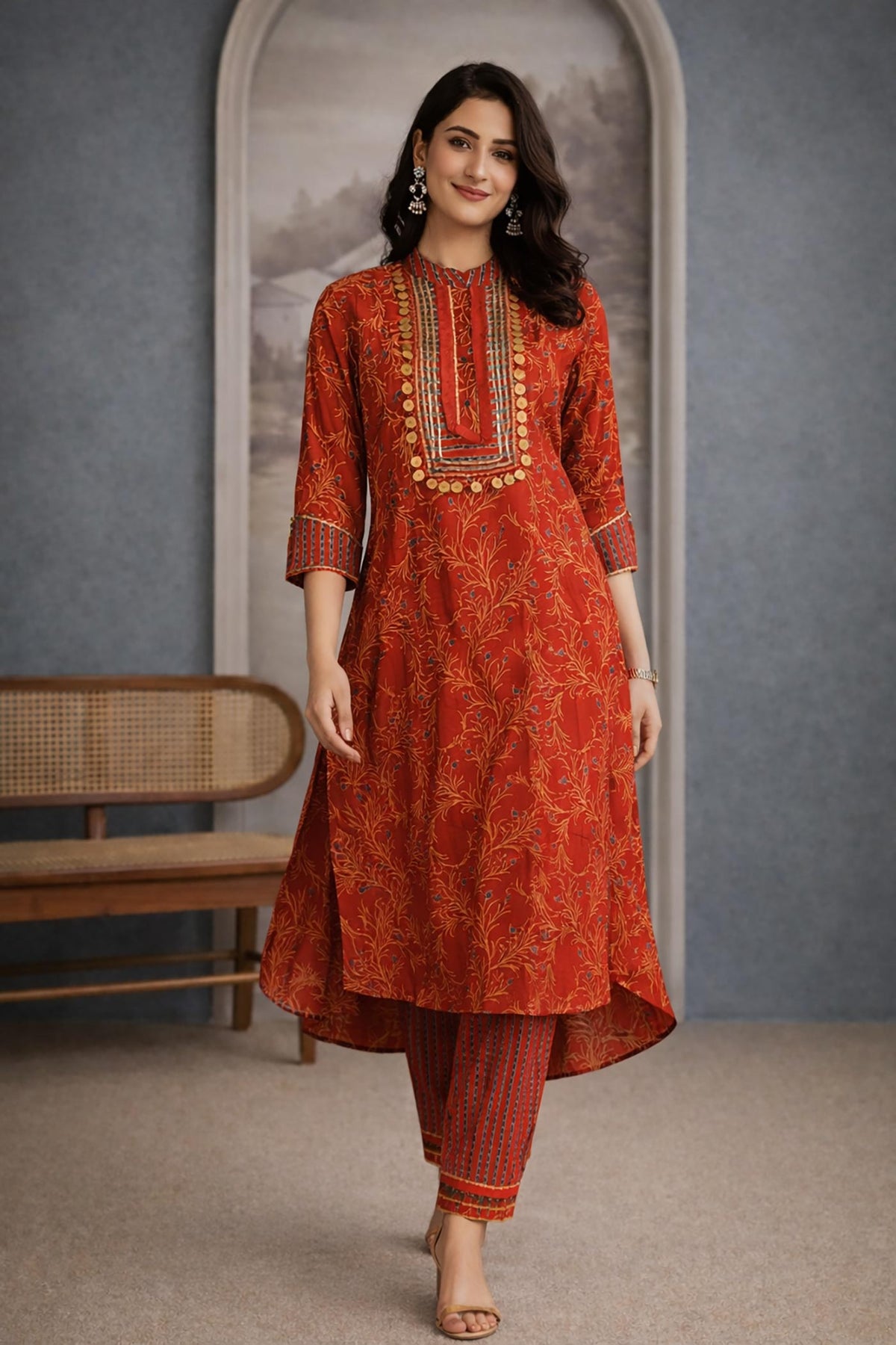 SN214 women’s vermilion red cotton kurta pant set with high-low hem and tapered pants walking pose