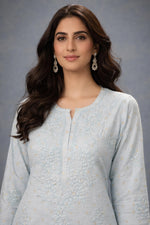 SN229 women’s powder blue cotton silk kurti closeup showing floral embroidery and round slit neckline detail