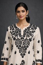 SN234 women’s ivory cotton kurta with black floral embroidery detail, V-neck and three-quarter sleeves, close-up view