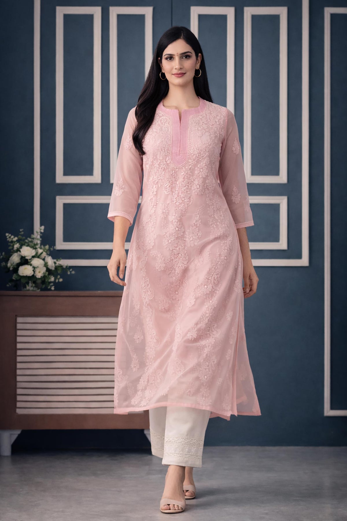 SN238 women’s blush pink embroidered organza kurta with three-quarter sleeves walking pose