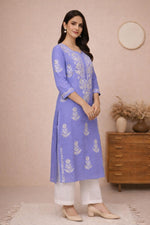 SN241 women’s periwinkle cotton straight kurta with embroidered detailing and three-quarter sleeves, side pose view.