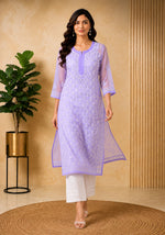 SN245 women’s lavender chikankari embroidered kurta with V-neck walking pose
