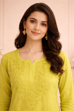 SN249 women’s lime green cotton embroidered kurti closeup showing round slit neckline and floral detailing