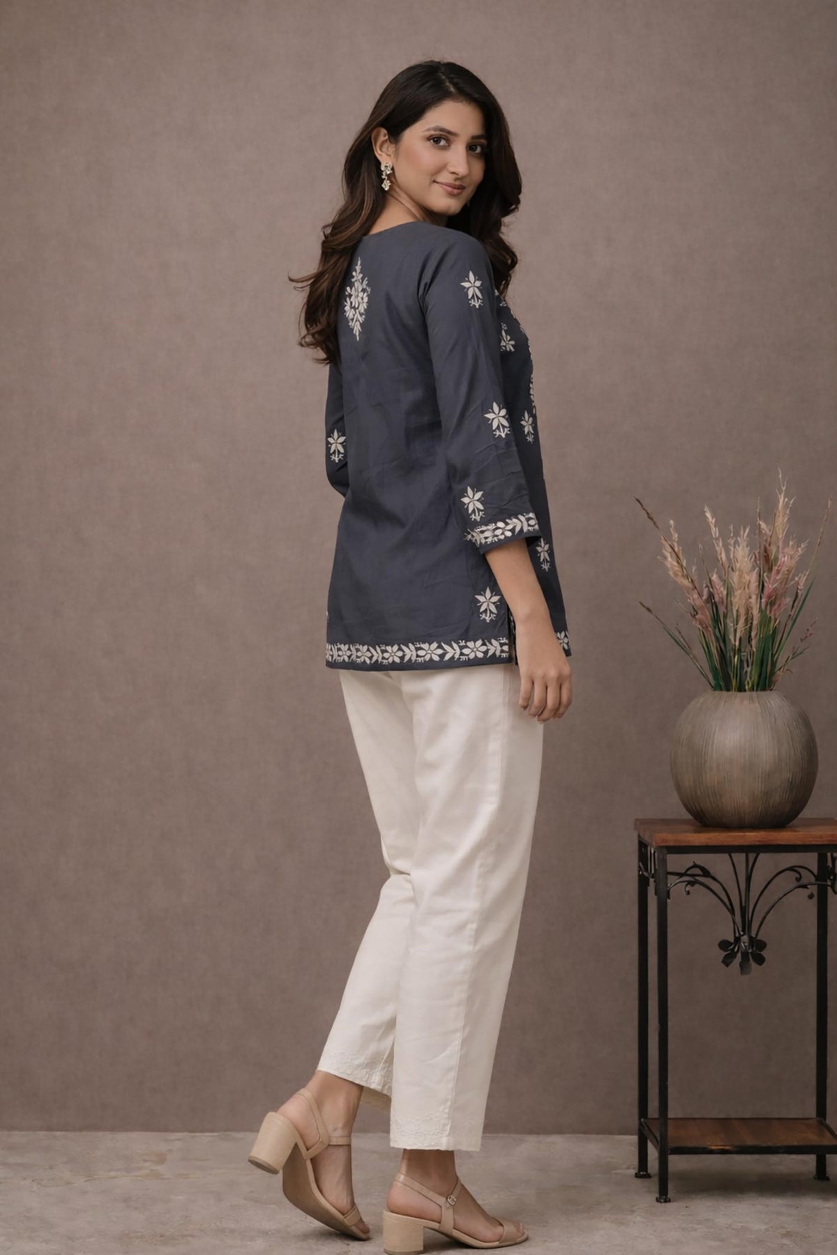 SN251 women’s slate grey cotton kurti with floral embroidery and three-quarter sleeves side pose