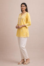 SN253 women’s butter yellow cotton chikankari kurti side pose with straight fit and three-quarter sleeves