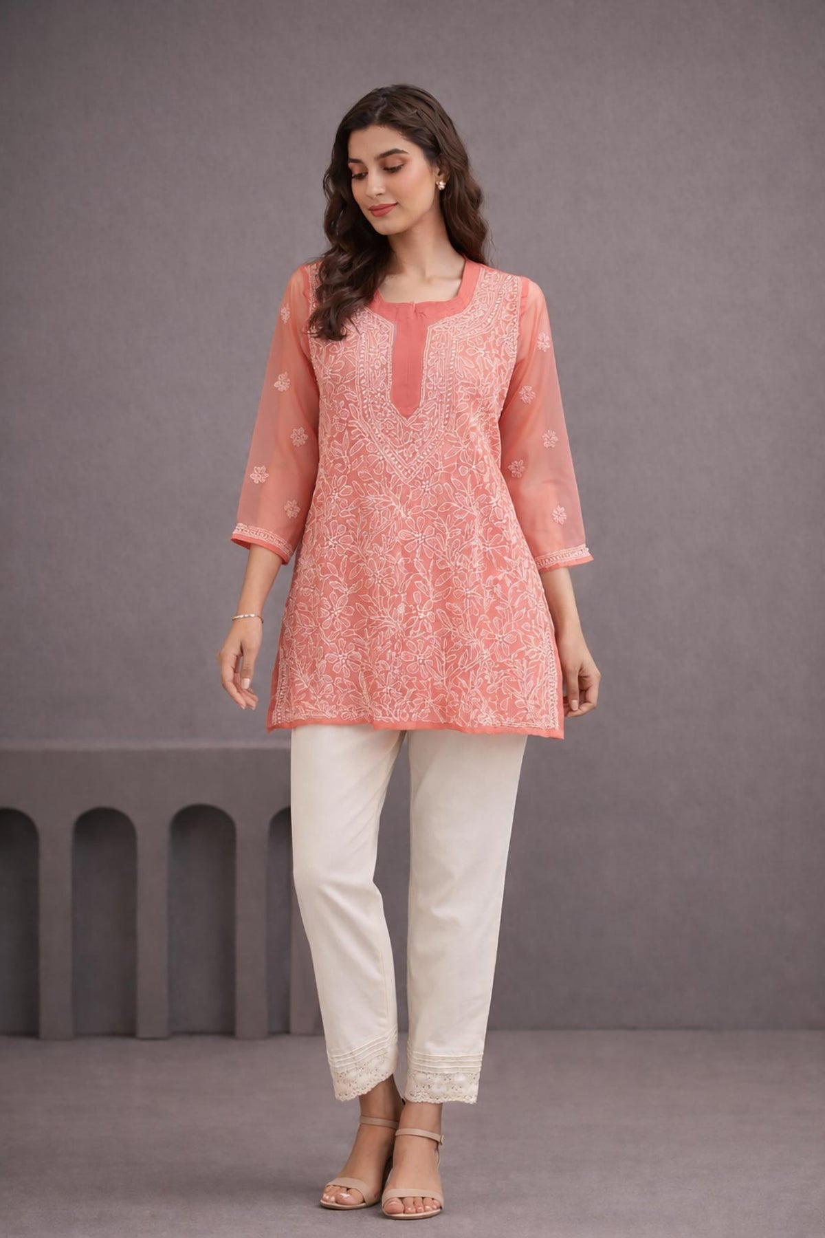 SN256 women’s coral orange organza short kurti with chikankari embroidery and three-quarter sleeves front pose