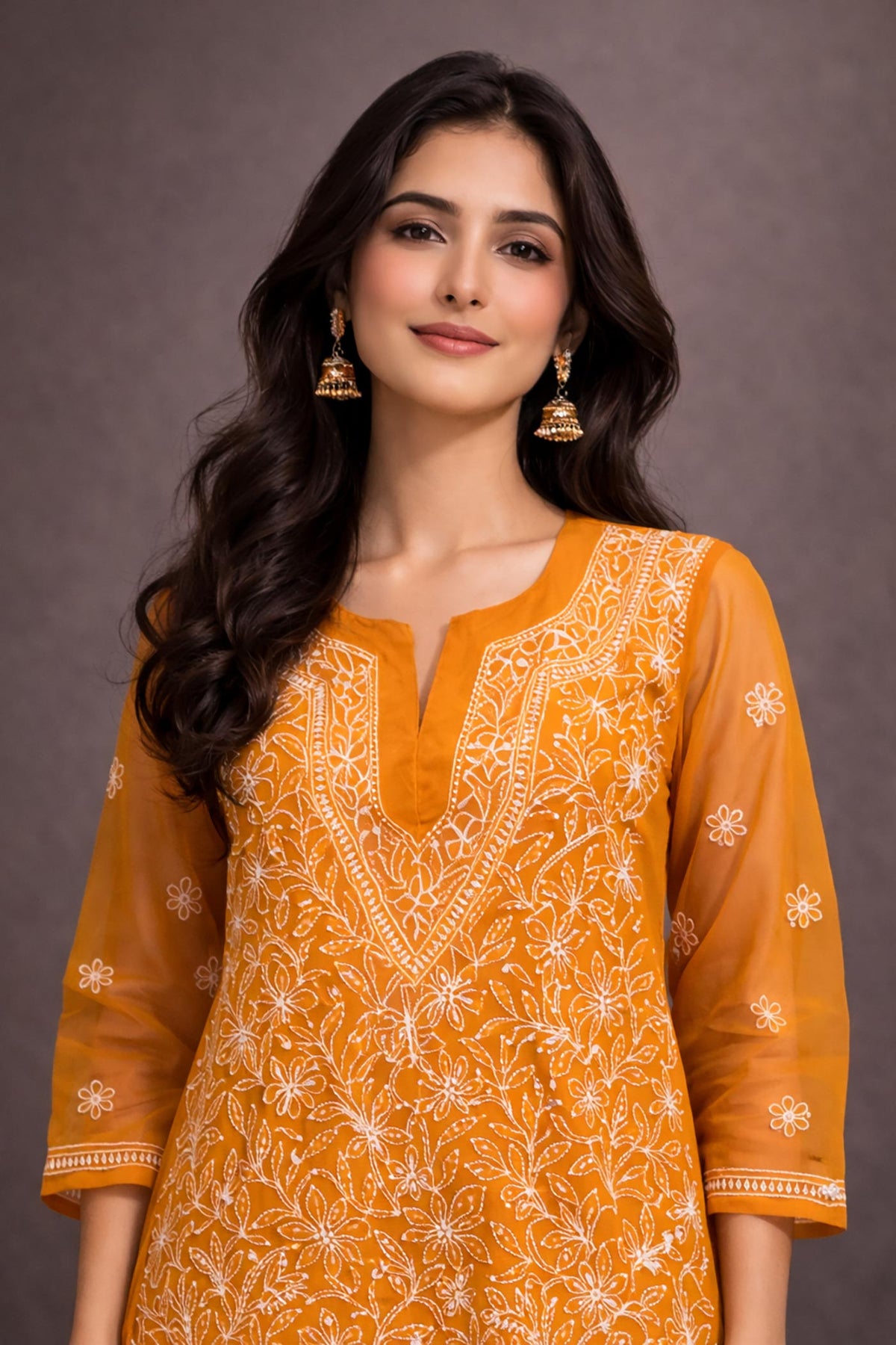 SN257 women’s mustard georgette chikankari kurti closeup showing V-neckline and detailed white embroidery