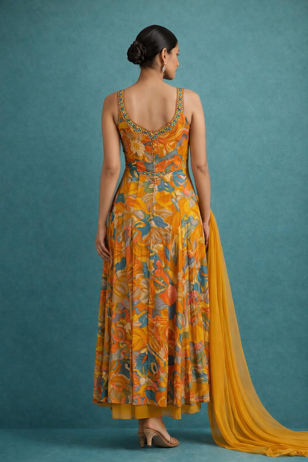 SN262 women’s burnt orange georgette maxi dress back view with sleeveless straps and flowing maxi silhouette