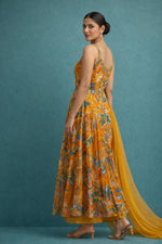 SN262 women’s burnt orange georgette maxi dress side view with sleeveless design and flowing A-line silhouette