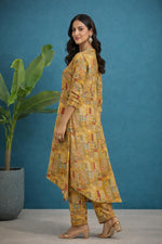 SN271 women’s mustard cotton kurta pant set side pose showing asymmetric hem and three-quarter sleeves