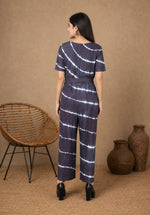 SN30 women’s black and white tie-dye V-neck jumpsuit with short sleeves – back pose