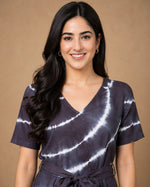 SN30 women’s black and white tie-dye V-neck jumpsuit with short sleeves – closeup pose