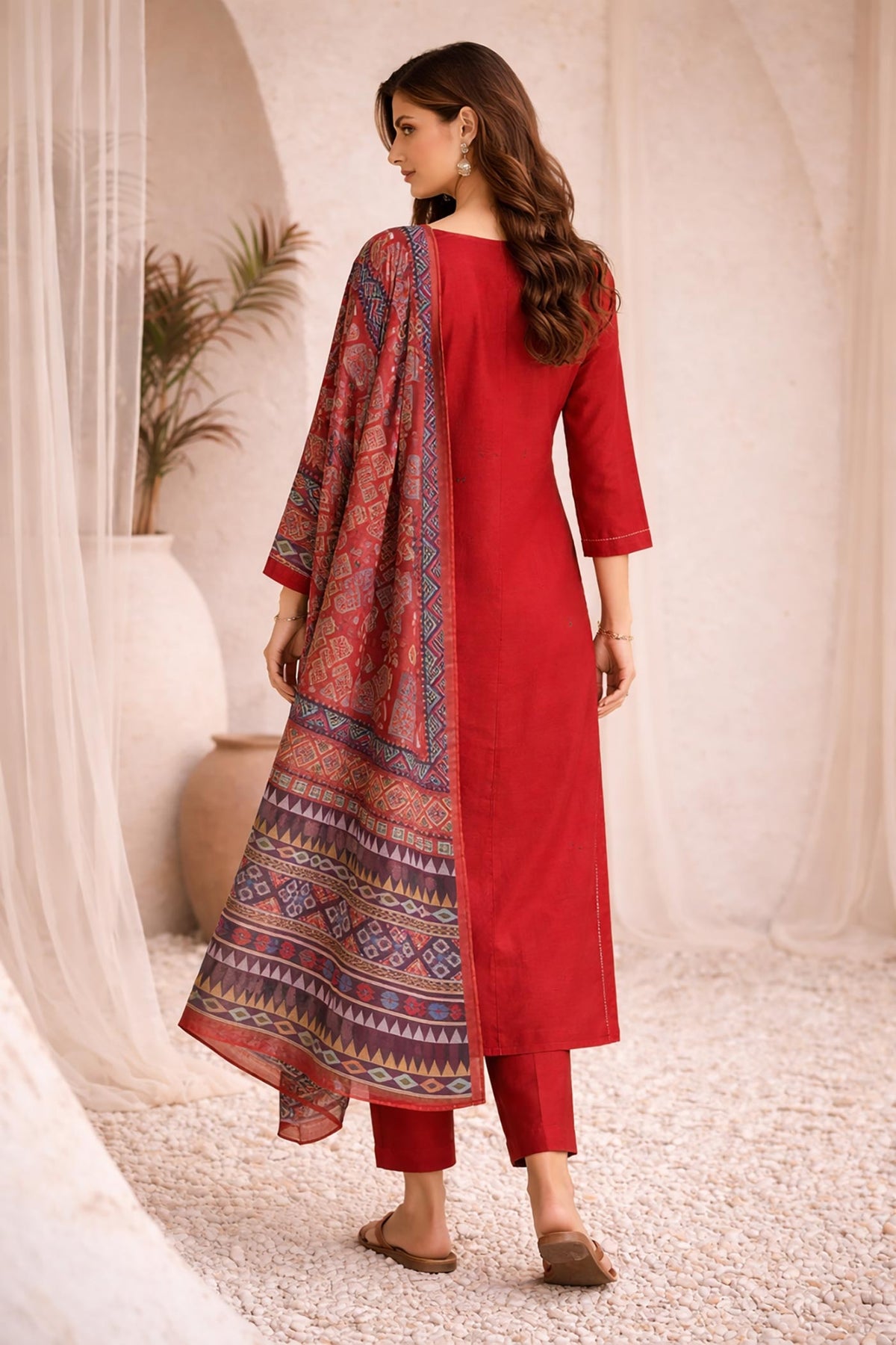 SN32 women’s rust red cotton kurta pant dupatta set back pose with straight fit design.