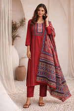 SN32 women’s rust red cotton kurta pant dupatta set with three-quarter sleeves front pose.