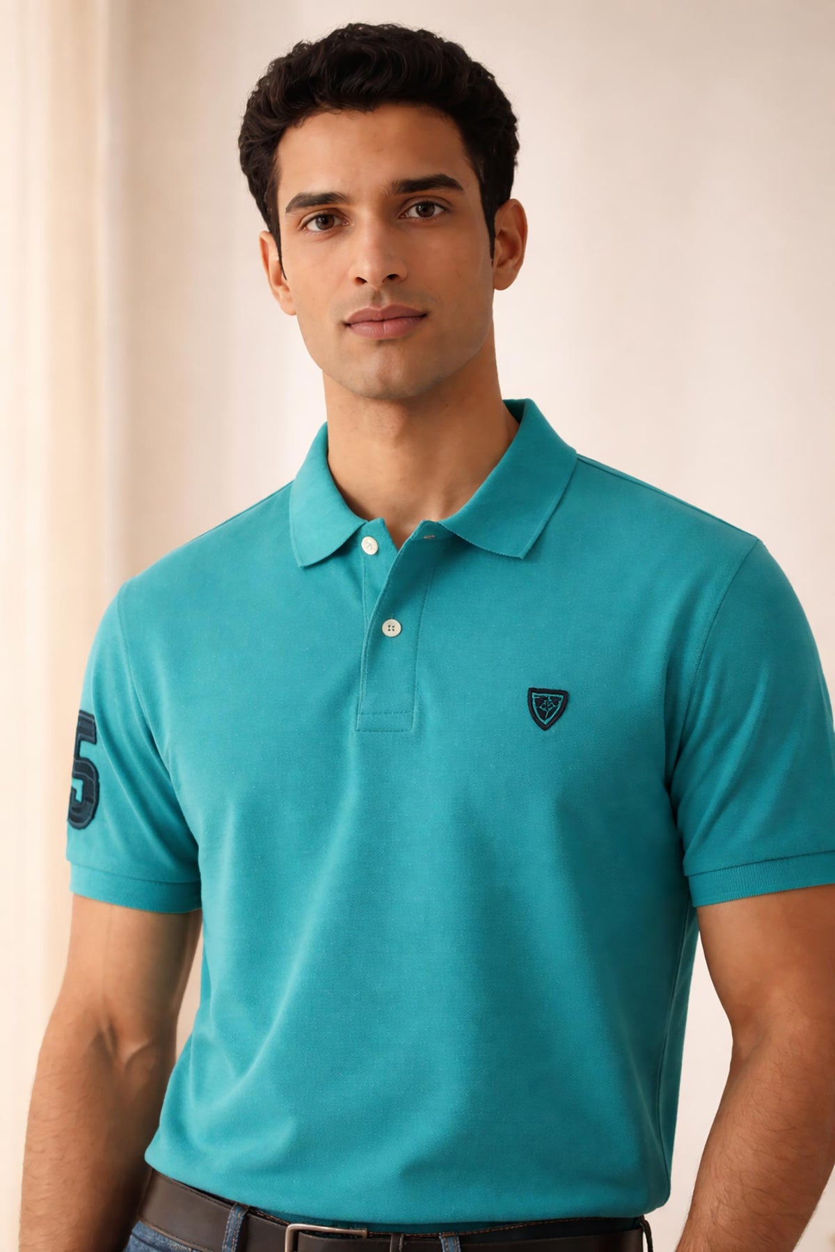 SN345 men’s turquoise cotton piqué polo t-shirt closeup, short sleeves, structured collar, two-button placket detail