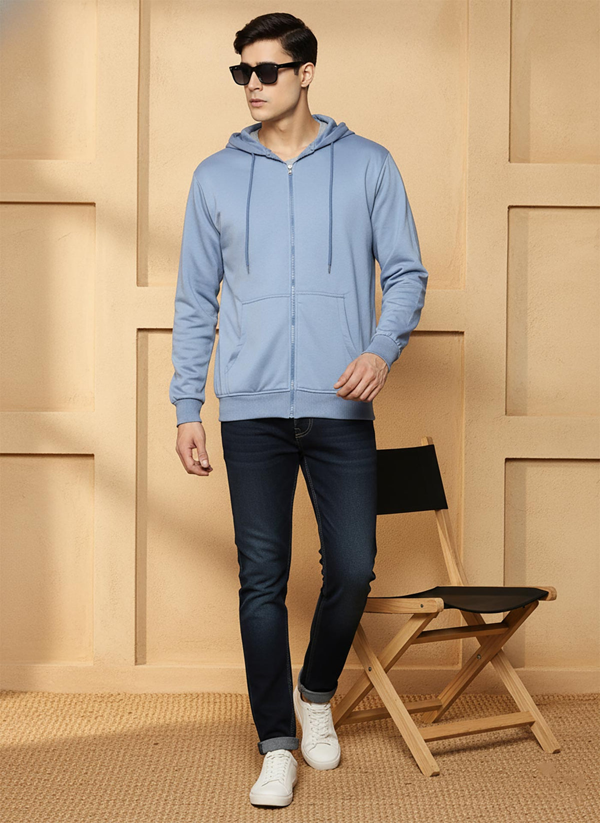 SN352 men’s powder blue cotton-blend zip hoodie walking pose styled with dark denim and white sneakers