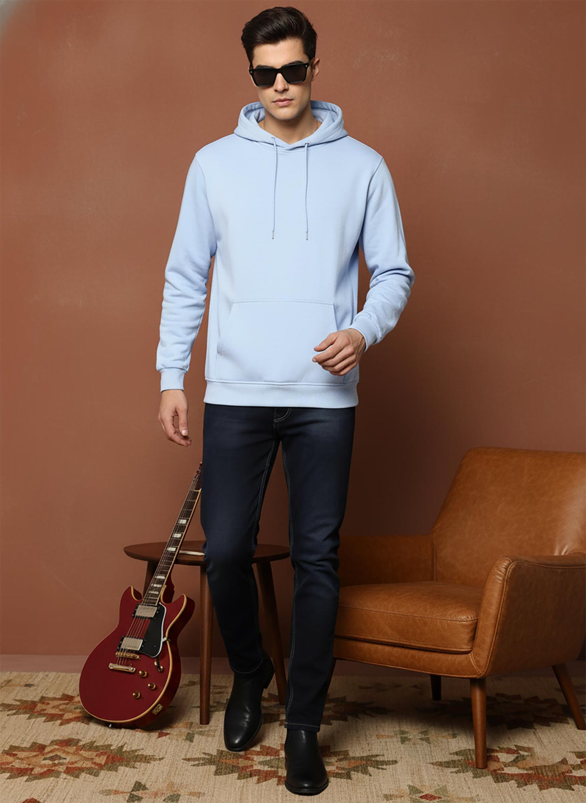SN358 men’s light blue cotton fleece hoodie with kangaroo pocket, walking pose styled with dark jeans