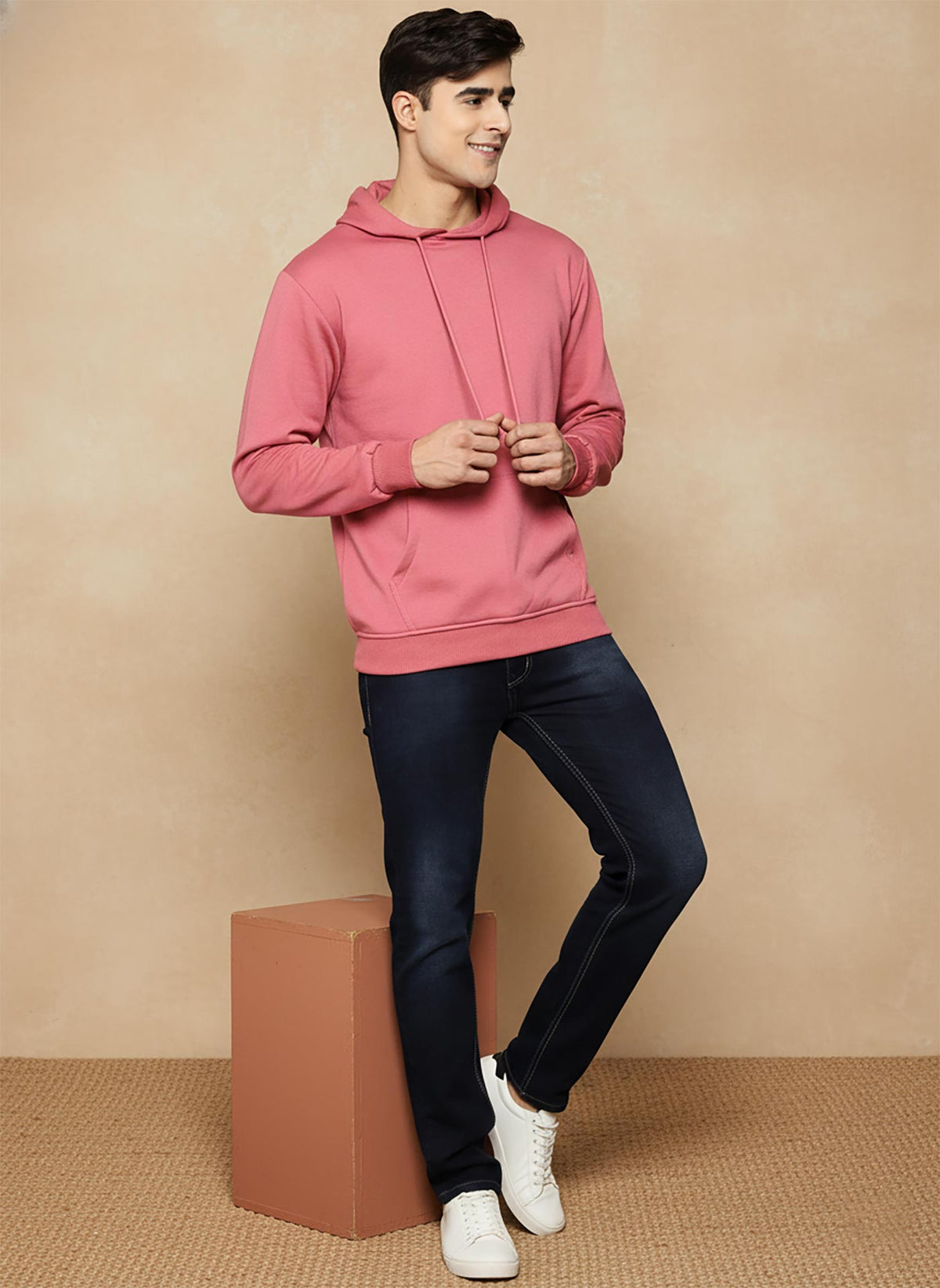 SN362 men’s rose pink cotton fleece hoodie with ribbed cuffs and kangaroo pocket, side pose.