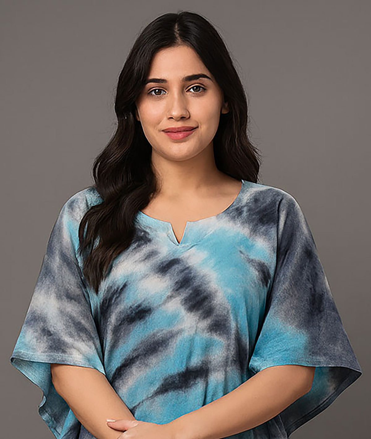 Close-up of women’s blue and black tie-dye kaftan kurti with round neckline and short sleeves, showcasing soft fabric and relaxed fit for casual wear