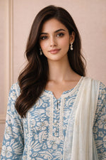 Powder blue floral kurta neckline with lace detailing and buttons, close-up front view.
