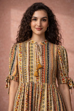 Close-up of women’s ethnic tribal printed midi dress showing pattern and sleeve detail