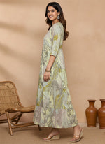 SN105 women’s olive abstract print flowy maxi dress with three-quarter sleeves side pose