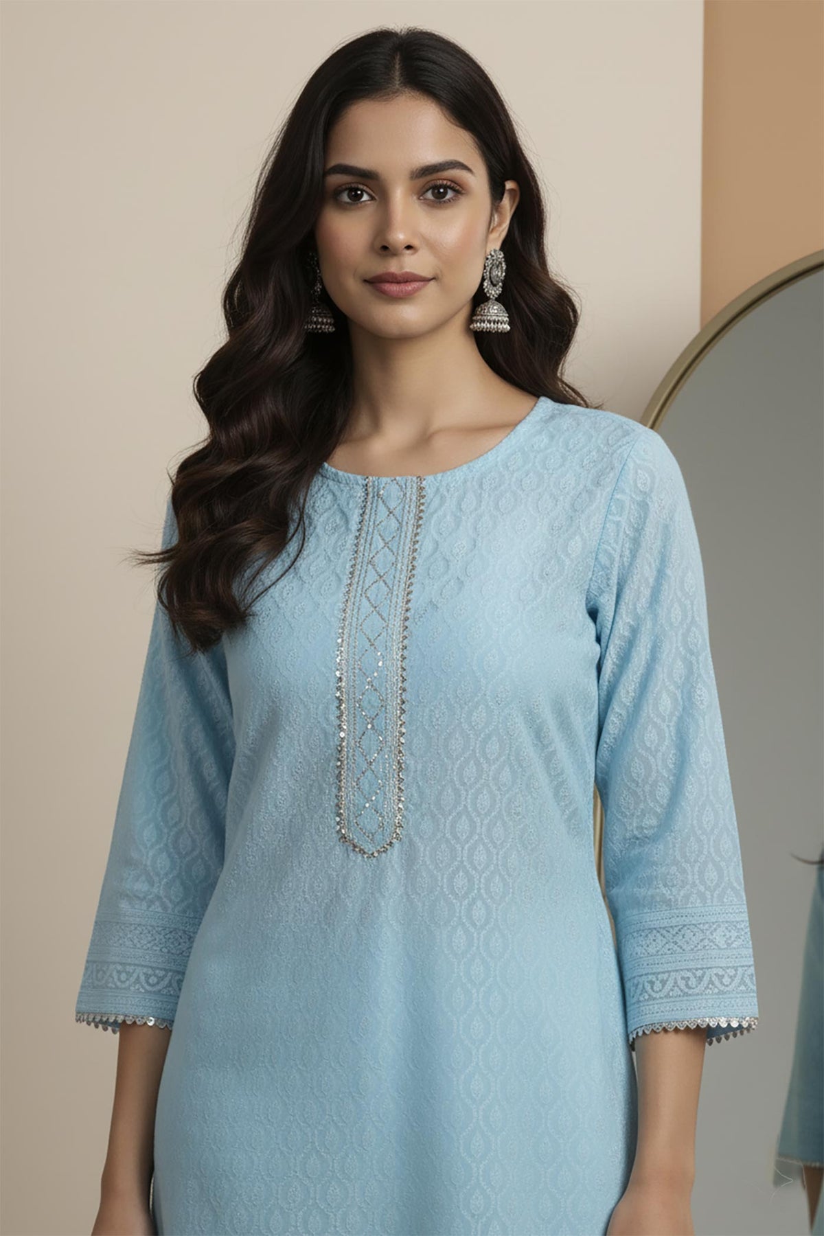 SN113 women’s sky blue cotton kurta with textured fabric and embroidered neckline closeup pose