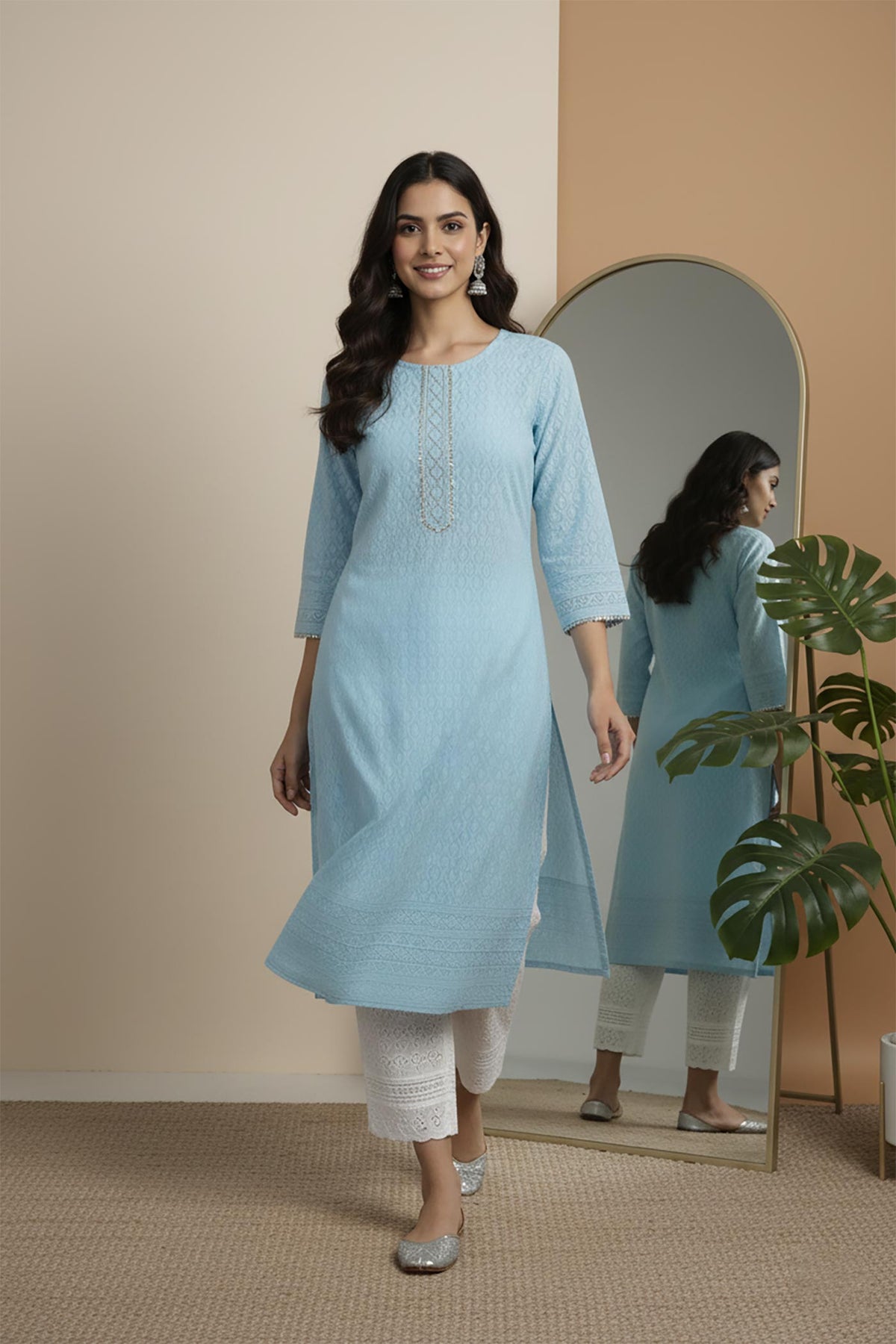 SN113 women’s sky blue cotton kurta pant set with round neck and lace pants walking pose